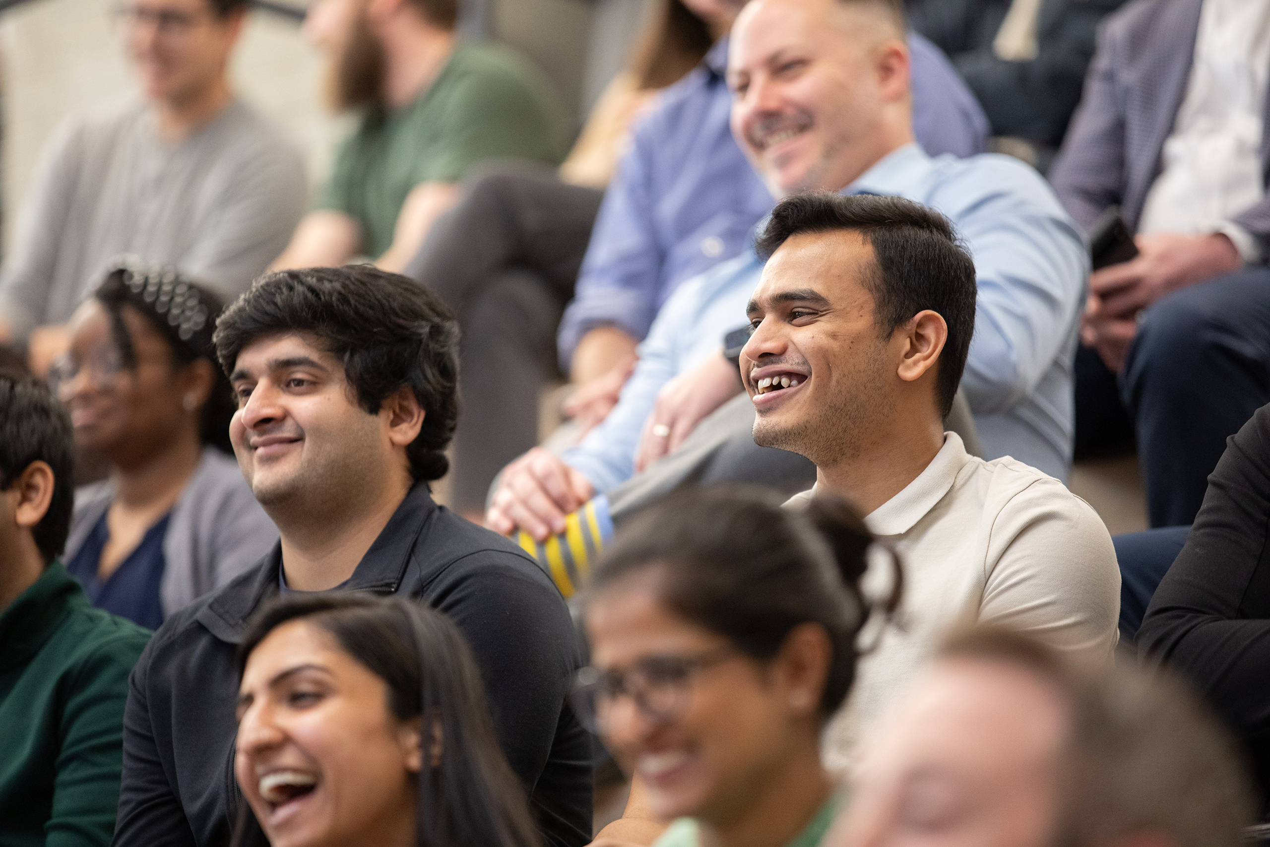 OneTrust employees attending company all-hands meeting in office